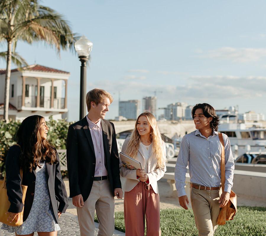 master of business administration mba students walk near the intercoastal waterway in 西<a href='http://acts.istarcasting.com'>推荐全球最大网赌正规平台欢迎您</a>.