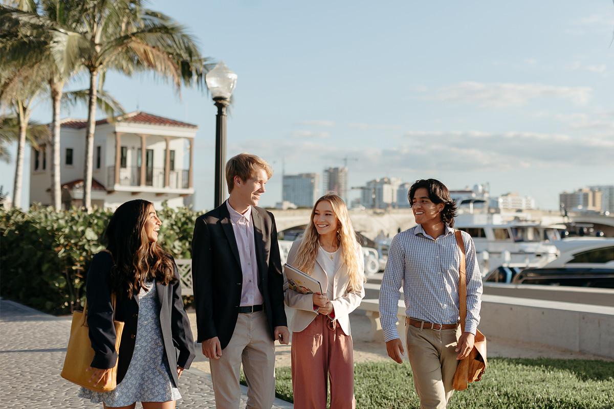 master of business administration mba students walk near the intercoastal waterway in 西<a href='http://acts.istarcasting.com'>推荐全球最大网赌正规平台欢迎您</a>.